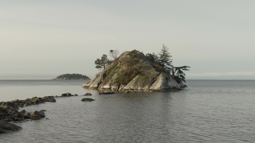 Aerial Panoramic View of Rocky Island on the Pacific Ocean West Coast. Sunny Sunrise. Whytecliff Park, Horseshoe Bay, West Vancouver, British Columbia, Canada.