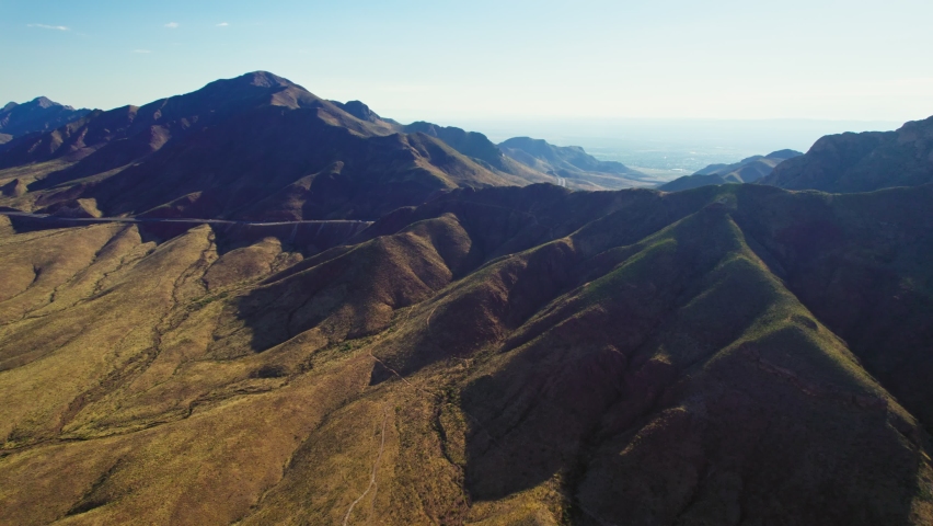 Southern Rockies, Franklin Mountains, El Paso Texas USA. Aerial Drone View Of Hot Arid Desert Mountain Range Landscape In Early Morning Daylight.