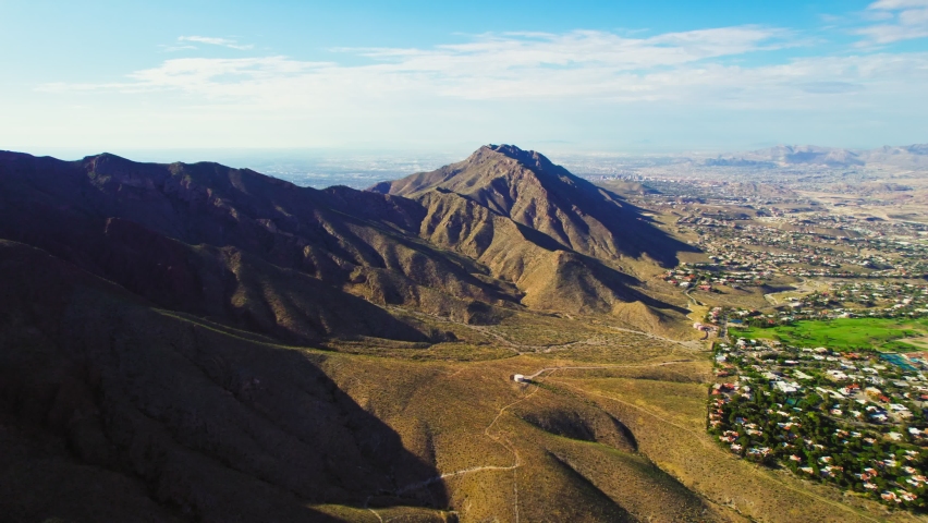 El Paso, Texas USA. Aerial Drone View Of Franklin Mountains State Park Landscape Near Bordertown Neighborhood Houses.