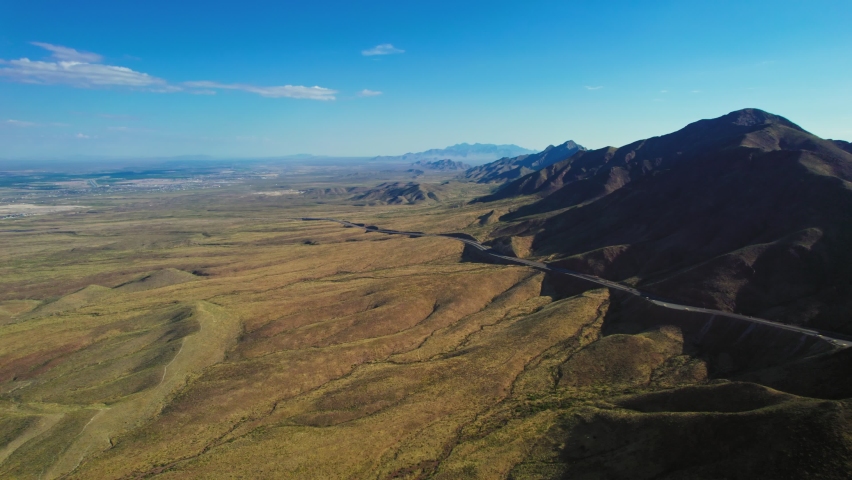 Transmountain Road, Franklin Mountains State Park, El Paso Texas. Aerial Drone View Of Road Going Through Arid Desert Mountains Near International Texas Bordertown.