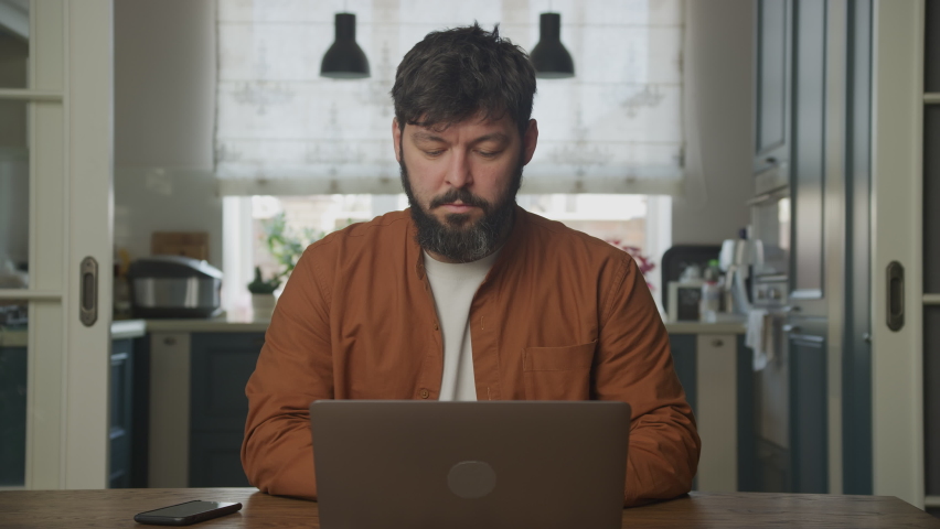 Upset young adult studying on a computer laptop 