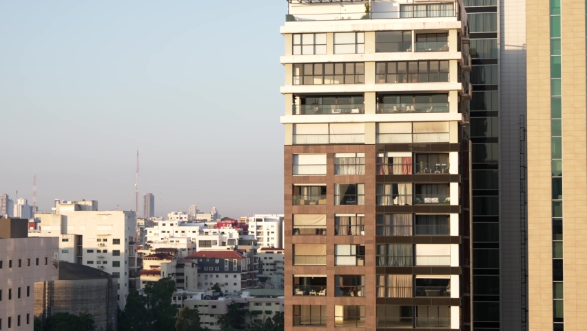 Close-up of residential building in downtown of Santo Domingo in soft evening light, Dominican Republic. Static shot