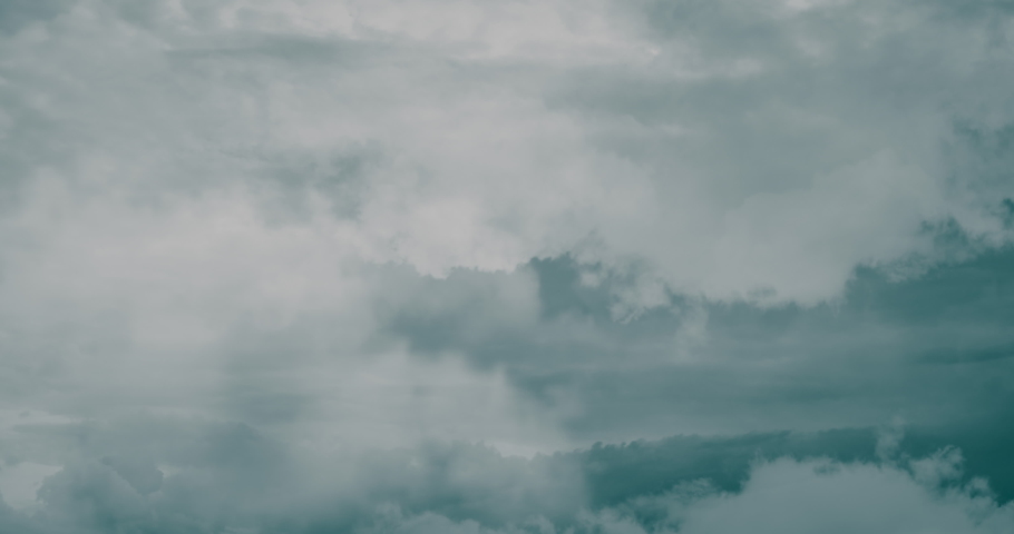 Flight in the clouds during the day