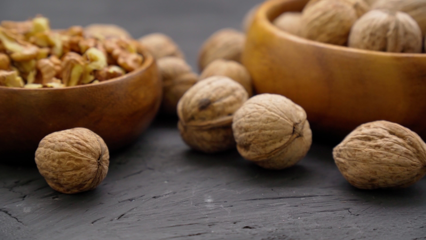 Walnut oil in glass of bottle. Healthy food for brain. Cooking and cosmetology