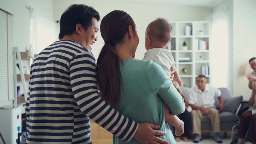 Happy Asian big family giving warm welcome with new member baby at home Royalty-Free Stock Footage #1092109135