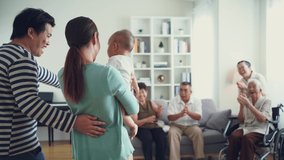 Happy Asian big family giving warm welcome with new member baby at home - Powered by Shutterstock - Get 15% off with code: PIKWIZARD15