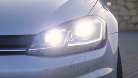 Car Front Full Led Light. Modern car headlamp flashing light with blinking on continuously indicator. Switched on led lights of luxury car. Car Blinker Light. - Powered by Shutterstock - Get 15% off with code: PIKWIZARD15