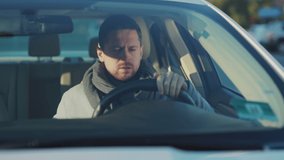 Caucasian bearded sick man sitting in car coughing cold sneezing allergy into paper napking driving work. Illness. Healthcare concept. - Powered by Shutterstock - Get 15% off with code: PIKWIZARD15