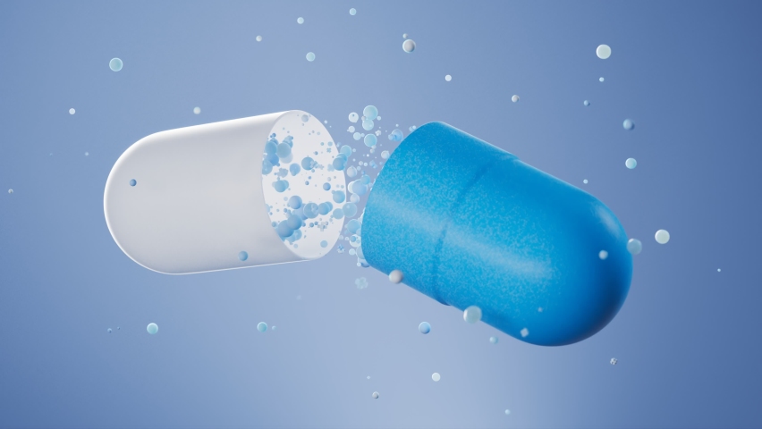 A big blue capsule encapsulates small particles of medicine or antibiotic against blue background. Concept of pharmacy, healthcare and medicine, therapy. Floating bubbles closed inside of a capsule.