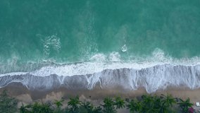 Aerial video water wave beach and sea Top-view High angle view above beach Nature and travel concept, Location: Phuket Thailand 