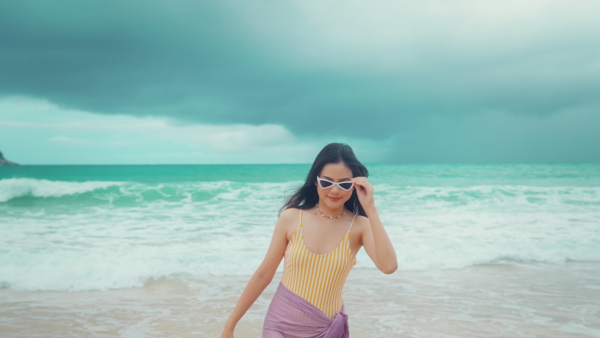 Young Beautiful woman in Bikini enjoying and relaxing on the beach,  Summer, vacation, holidays, Lifestyles concept.