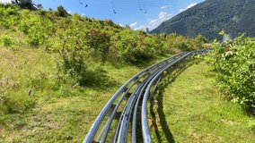 first person point of view from alpine roller coaster in the summer
Alpine mountain downhill coaster, Black forest,Germany
 - Powered by Shutterstock - Get 15% off with code: PIKWIZARD15