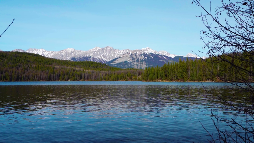 Pyramid Lake. Jasper National Park mountain range landscape, panoramic view. Canadian Rockies nature scenery background. Alberta, Canada. Mount Colin, Hawk Mountain.