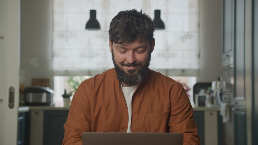 Young adult studying on a computer laptop 