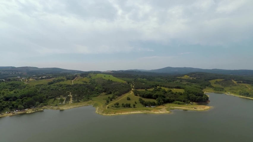 lake and hills, aerial blue lake and green hills