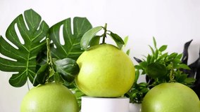 tropical fruit grapefruit on rotating platform white background - Powered by Shutterstock - Get 15% off with code: PIKWIZARD15