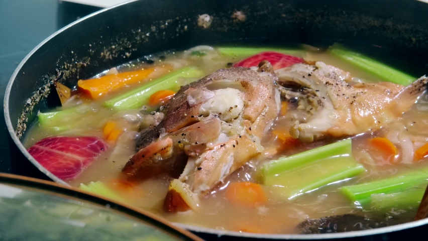 Fish soup with vegetables. Healthy food, fish soup with carrot, Gefilte fish