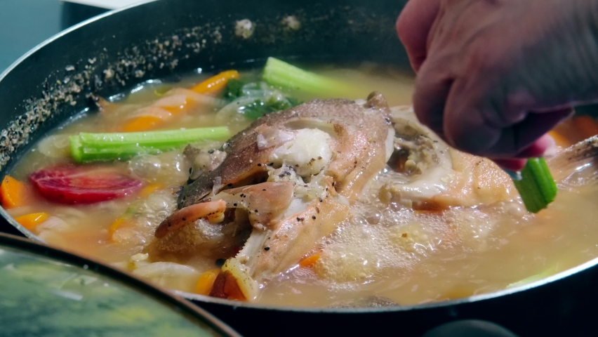 Fish soup with vegetables. Healthy food, fish soup with carrot, Gefilte fish