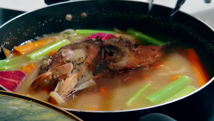 Fish soup with vegetables. Healthy food, fish soup with carrot, Gefilte fish