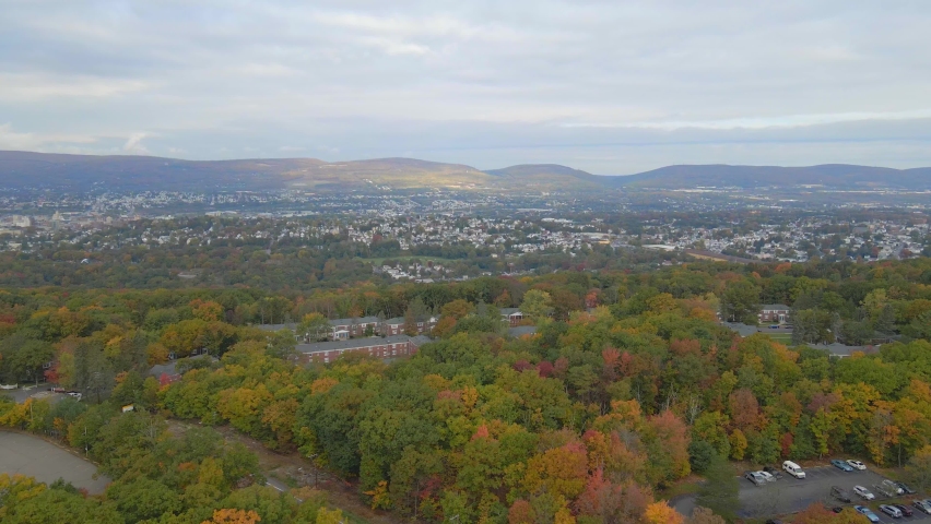 An aerial view over stunning Pennsylvania in the outskirts of Philadelphia. Drone shot with the mountains in the background.