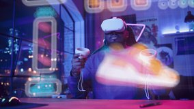 African American Sneaker Designer Wearing Virtual Reality Headset and Using Controllers to Design a Stylish Streetwear Shoe in Augmented Design Software. Black Man Working on Custom NFT Sneaker. - Powered by Shutterstock - Get 15% off with code: PIKWIZARD15