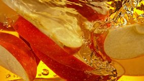 Super Slow Motion Shot of Red Apple Slices Falling into Juice Vortex at 1000 fps. - Powered by Shutterstock - Get 15% off with code: PIKWIZARD15