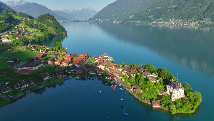 scenic peaceful Swiss lake, aerial view of Iseltwald on Brienz lake in Switzerland, beautiful Swiss nature, clear lake in Switzerland Royalty-Free Stock Footage #1092270887