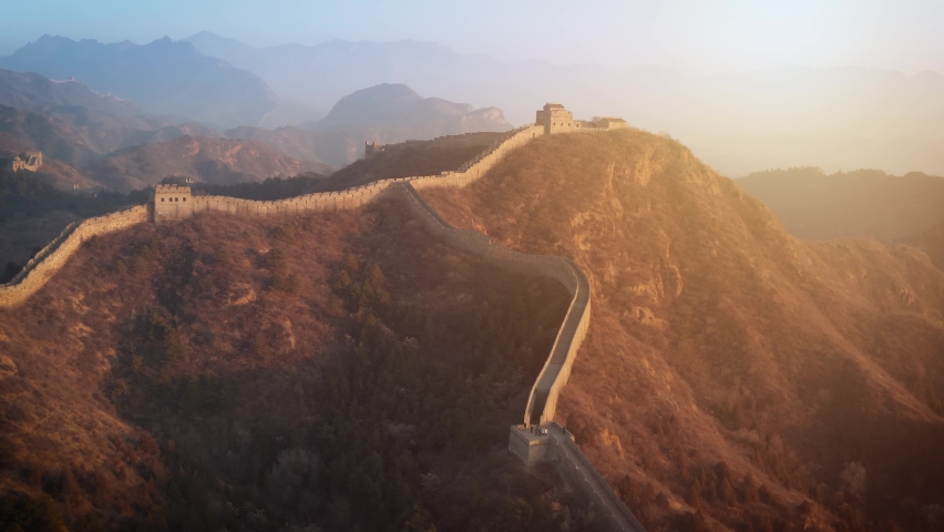 Aerial shot of the Great Wall of China at sunrise. Royalty-Free Stock Footage #1092274251