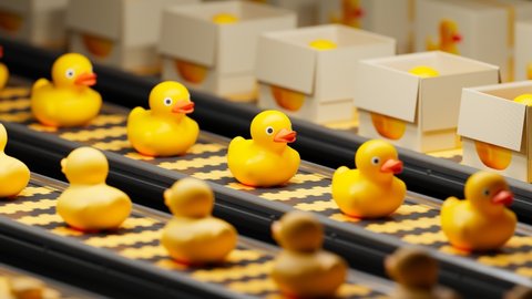 Production line filled with yellow rubber ducks. Cute toy moving constantly with a conveyor belt. Factory of kids toys. Packed ducks in the background. Endless looping animation. 4K HD render Video de stock
