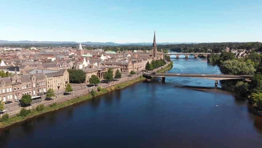 Aerial view above the river Tay and City of Perth. Scotland, United Kingdom. Drone descending. Royalty-Free Stock Footage #1092293005