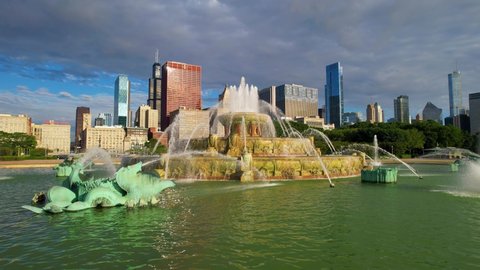 Chicago , Illinois , United States - 07 10 2022: Chicago Downtown Skyline With Buckingham Fountain Under Cloudy Morning Sky