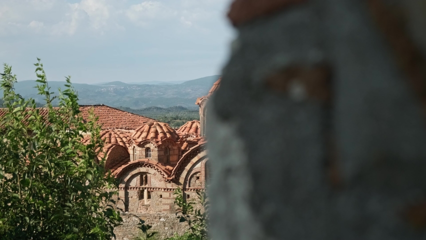 Church of Hagia Sophia in Mystras ancient town near Sparta, Greece, panning shot. UNESCO archaeological sight. Royalty-Free Stock Footage #1092297461