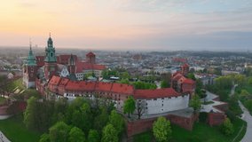 Flying around of Wawel castle in Krakow, Poland, historic polish palace in the morning, sightseeing and tourism in Poland, Krakow. High quality 4k footage