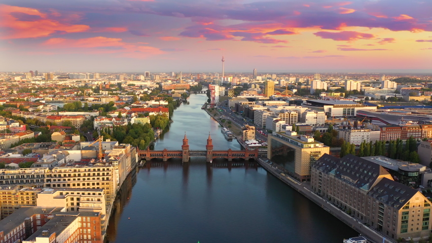 Berlin skyline aerial view at sunset colored sky bridge and river berlin city germany. Royalty-Free Stock Footage #1092308261