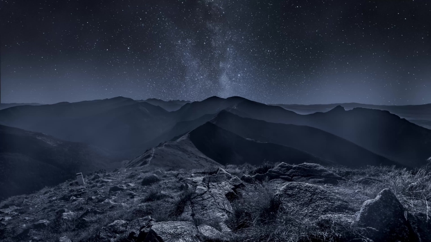 Timelapse of milky way in mountains at night in Poland