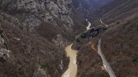 Aerial video. Slow Motion. The Moraca River Canyon in winter. Montenegro