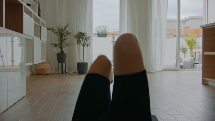 POV First person view of Caucasian female doing some exercises at home Royalty-Free Stock Footage #1092321611