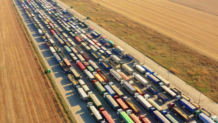 The Ukrainian port is blocked, a huge queue of trucks loaded with grain crops. | Shutterstock HD Video #1092326503