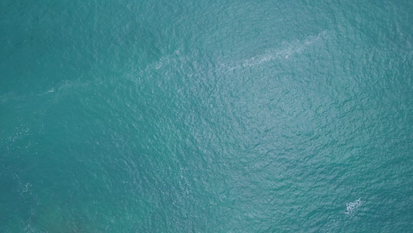 Top view Beautiful sea summer landscape Waves sea water surface High quality video Bird's eye view Royalty-Free Stock Footage #1092328423