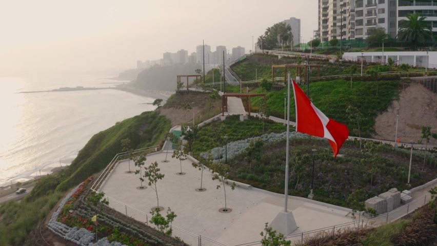 Aerial view of of "Parque Bicentenario" in Armendariz downhill, Miraflores town and the Costa Verde reef in Lima, Peru. In background the coast and the ocean.