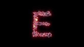 purple shining fashion gemstones font - letter E on black, isolated - loop video