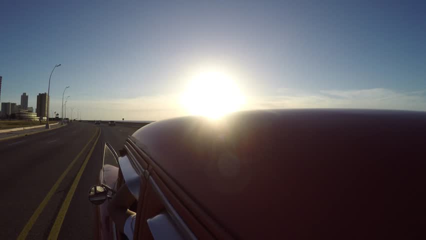 Driving vintage car in Havana, Cuba