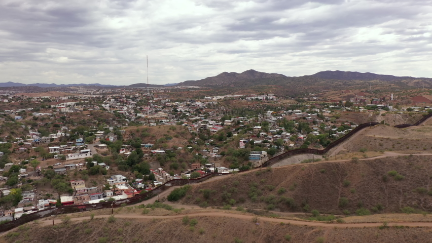 US Mexico border in Nogales Arizona. People crossing the border at port of entry 5117.
