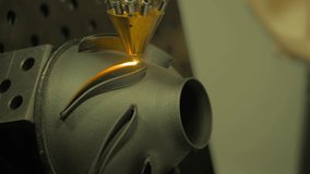 Metalworking, robotic, industrial concept. Direct metal deposition - advanced additive laser melting and powder spray manufacturing technology for repair, rebuild metal workpieces - slow motion - Powered by Shutterstock - Get 15% off with code: PIKWIZARD15