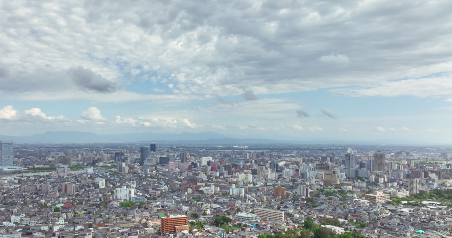 Aerial - Tourism and Business video Cityscape of Niigata City, Niigata, Japan. Tracking RtoL