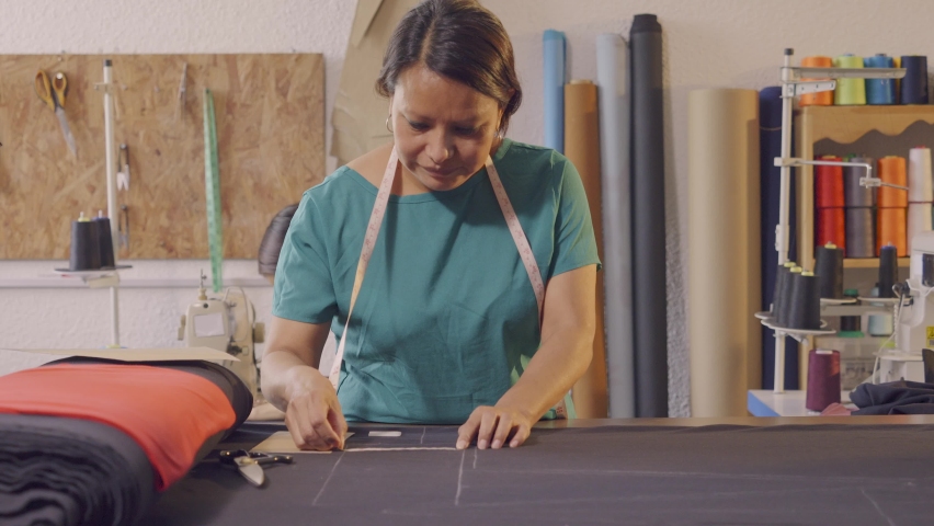 Latin women making clothes in an artisan workshop. Royalty-Free Stock Footage #1092375457