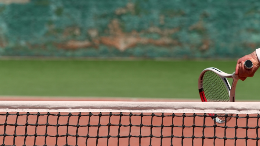 Super Slow Motion Shot of Tennis Hit Over the Net at 1000fps.