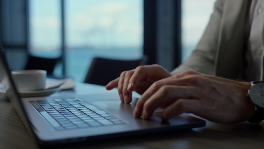 Businessman hands using computer touchpad in ocean view office. Unknown expert reading documents at luxury workplace. Manager checking report at panorama window place. Leader boss at luxury work  Royalty-Free Stock Footage #1092386357