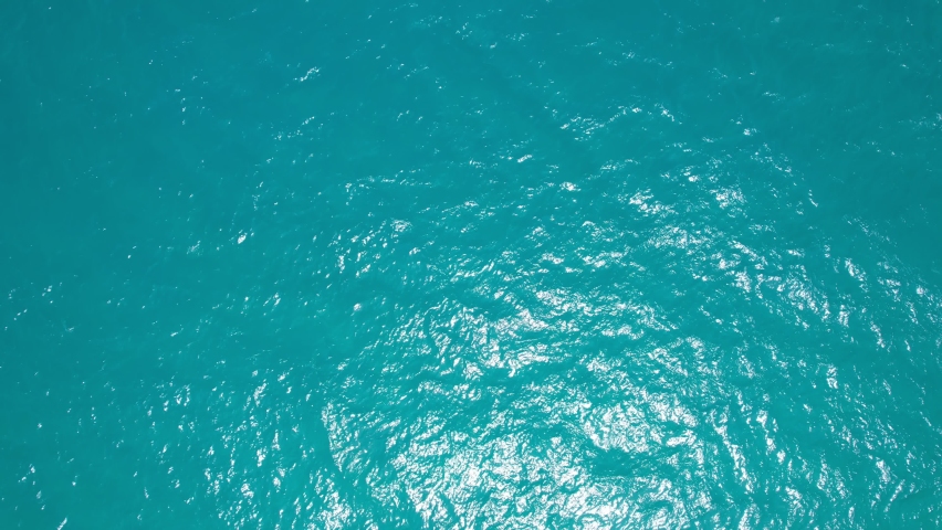 Beautiful sea summer landscape Waves sea water surface High quality video Bird's eye view Royalty-Free Stock Footage #1092395941
