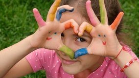 Child hands park drawing paint. Selective focus. - Powered by Shutterstock - Get 15% off with code: PIKWIZARD15
